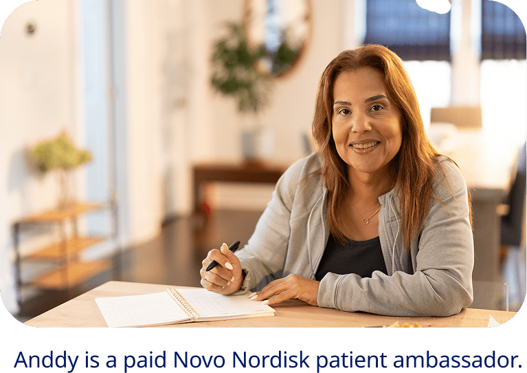 Anddy, a paid Novo Nordisk patient ambassador, writing in a notebook